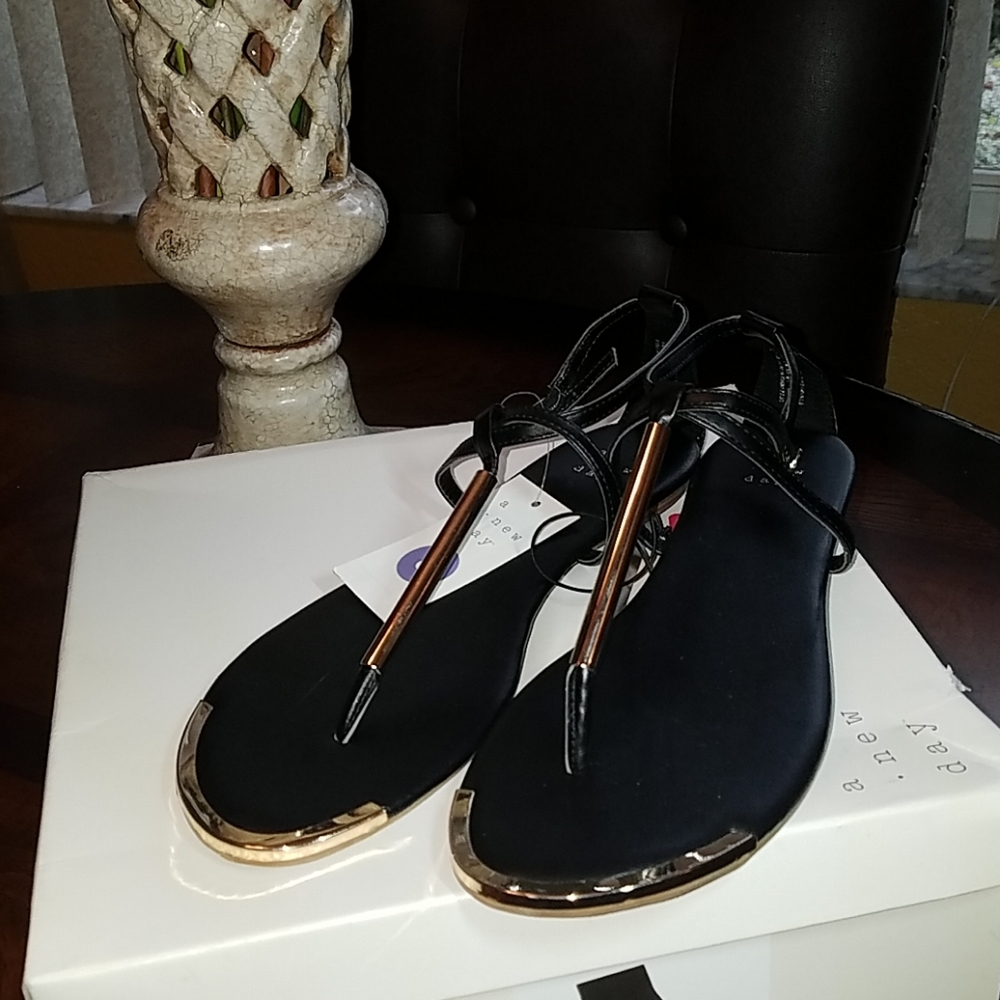 Black and gold sandals